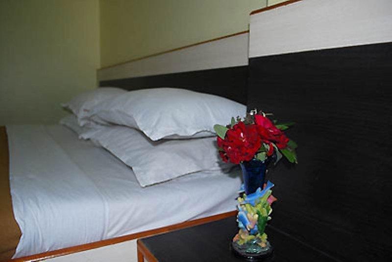 Hotel Sai Ganesh Shirdi Quarto foto